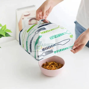 Foldable food cover to protect dishes from dust and insects, perfect for picnics.
