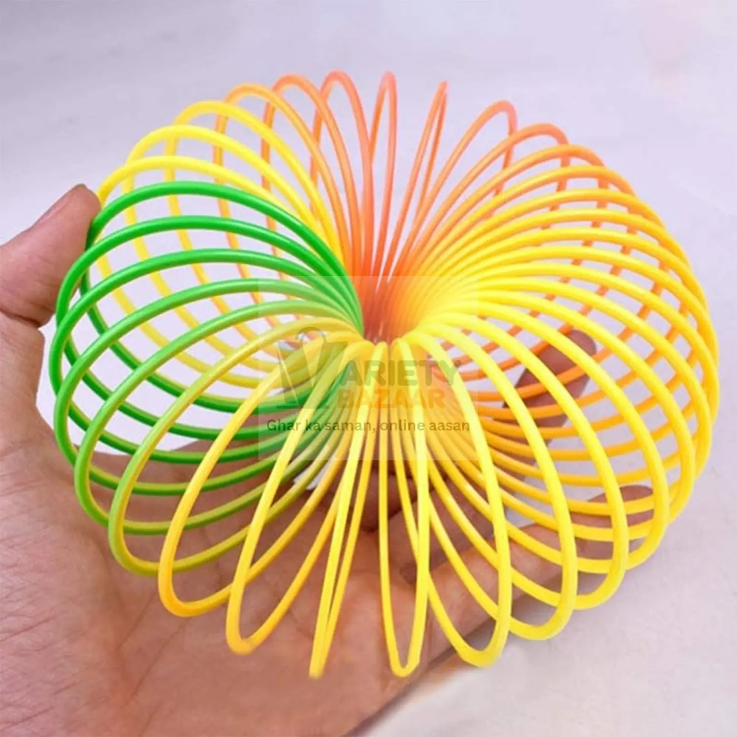 Rainbow Slinky Spring Toy – Compact, Portable Fun Toy for Kids & Adults, Great for Birthdays (1 Pc) Variety Bazaar