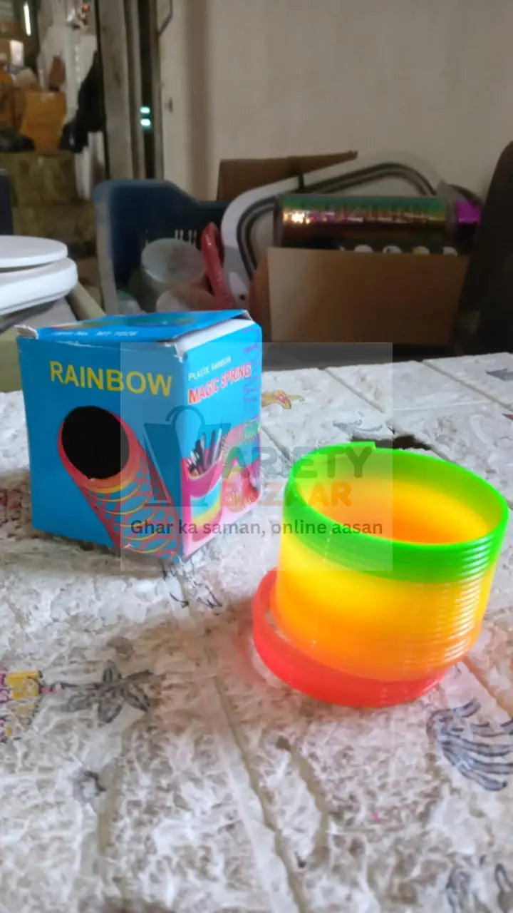 Rainbow Slinky Spring Toy – Compact, Portable Fun Toy for Kids & Adults, Great for Birthdays (1 Pc) Variety Bazaar